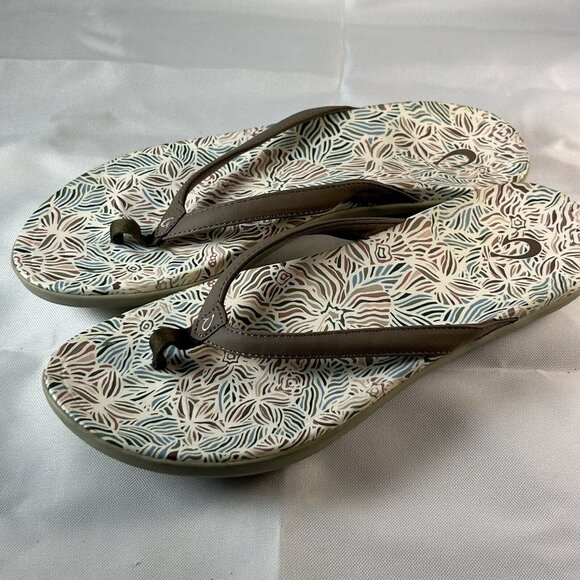 OluKai Ho'opio Hau Women 's Flip Flop in Warm Taupe/ Hau Size 10 - Picture 1 of 2